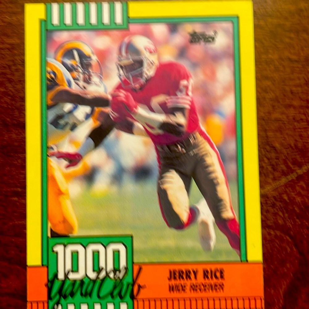 Jerry Rice 1000 yard club.  Topps card 1990